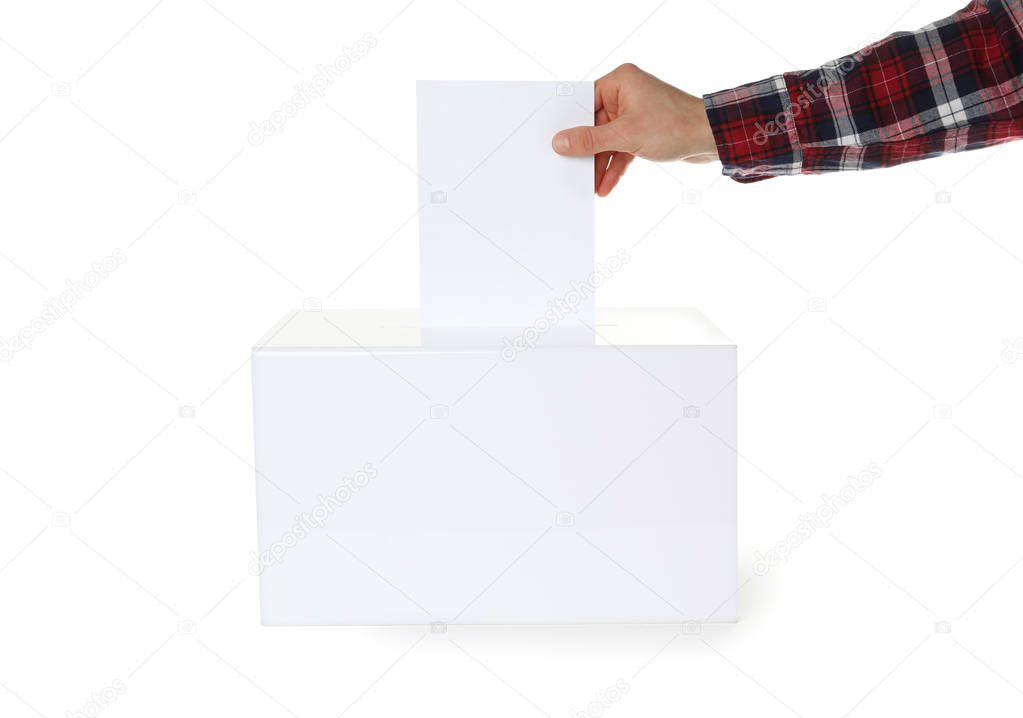 Man putting his vote into ballot box on white background, closeup