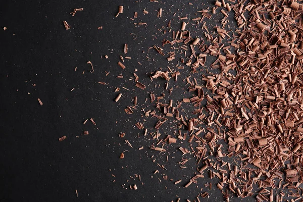 チョコレートと黒の背景 トップ ビュー上のテキストのためのスペース — ストック写真