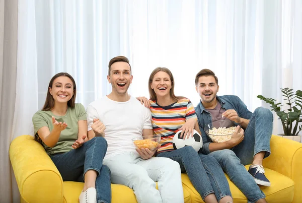 Group People Watching Together Sofa Living Room Space Text — Stock Photo, Image