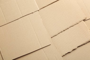 Arka plan, üstten görünüm olarak karton parçaları. Geri dönüşüm kavramı