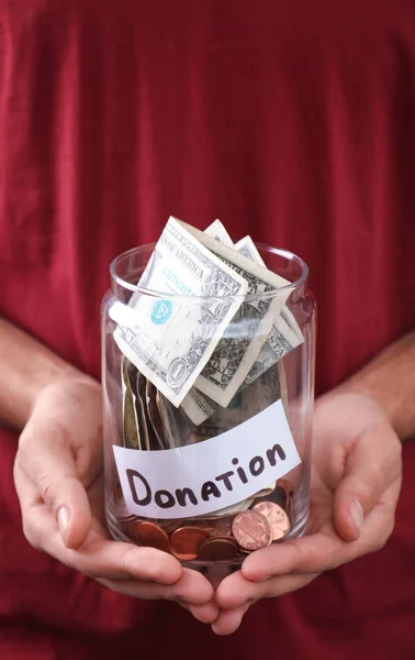 Man Holding Jar Money Label Donation Closeup — Stock Photo, Image