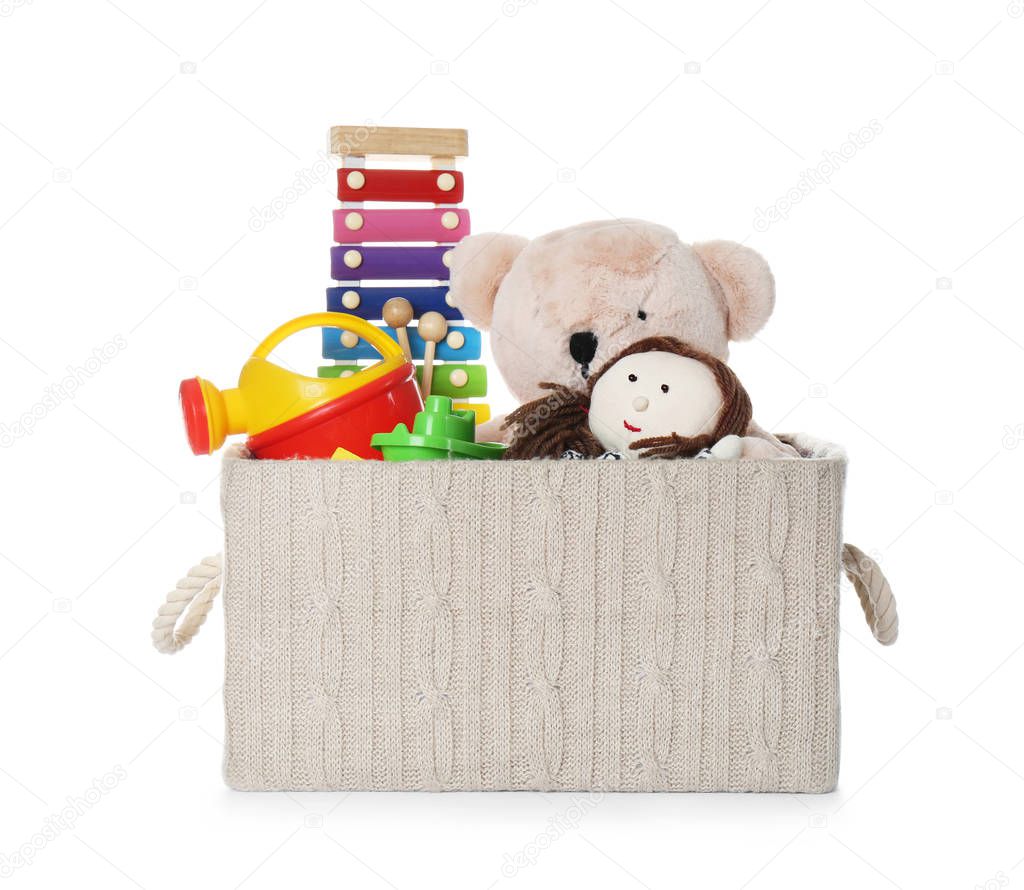 Box with different child toys isolated on white
