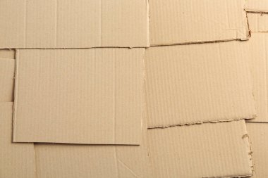 Arka plan, üstten görünüm olarak karton parçaları. Geri dönüşüm kavramı