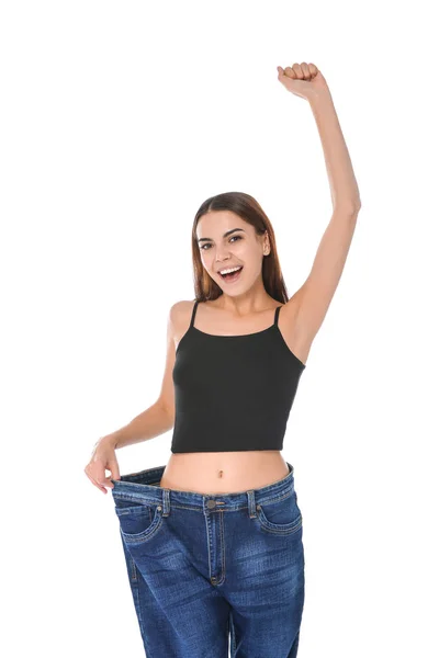 Schlanke Frau Übergroßen Jeans Auf Weißem Hintergrund Gewichtsverlust — Stockfoto