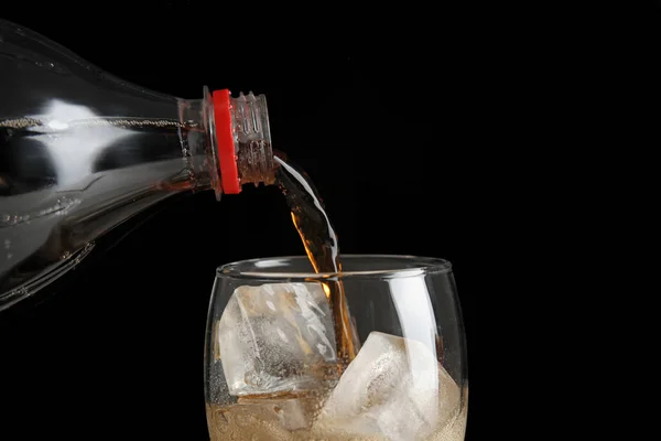 Pouring Refreshing Cola Bottle Glass Ice Cubes Black Background Closeup — Stock Photo, Image