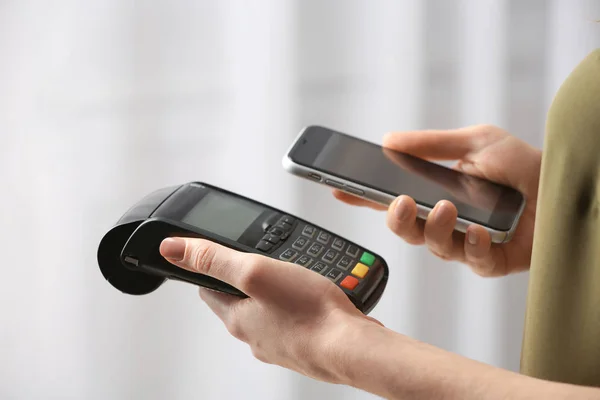 Woman Using Modern Payment Terminal Mobile Phone Indoors Closeup — Stock Photo, Image