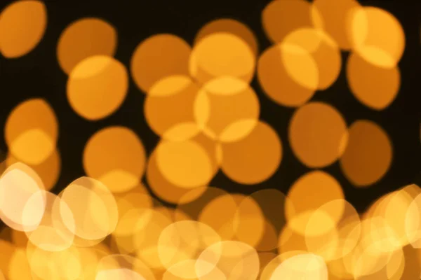 Hermosas Luces Doradas Sobre Fondo Oscuro Efecto Bokeh — Foto de Stock