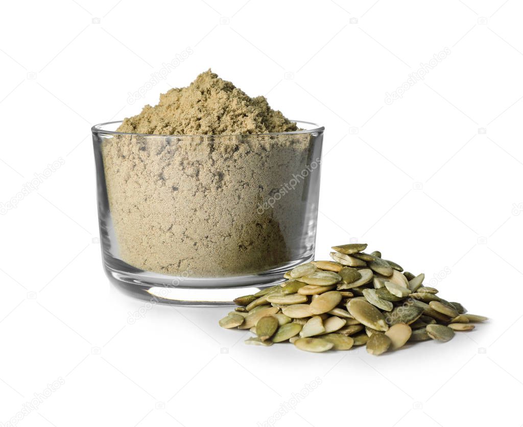 Bowl of fresh pumpkin seed flour and kernels isolated on white