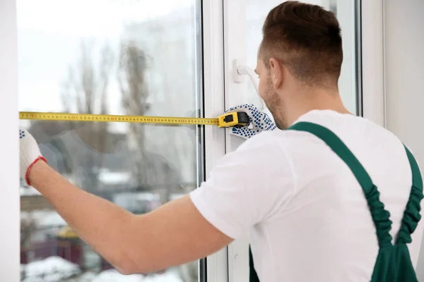 Construction Worker Adjusting Installed Window Screwdriver Indoors — Stock Photo, Image