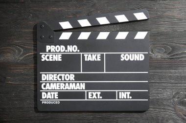 Klaket ahşap arka plan, üstten görünüm üzerinde. Sinema üretim