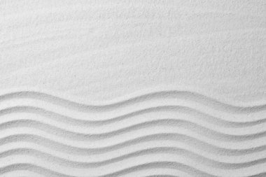 Arka plan olarak kum, metin için yer ile üstten görünüm Zen Bahçe izi. Meditasyon ve uyum