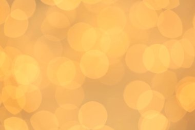 Arka plan olarak güzel altın ışık. Bokeh etkisi