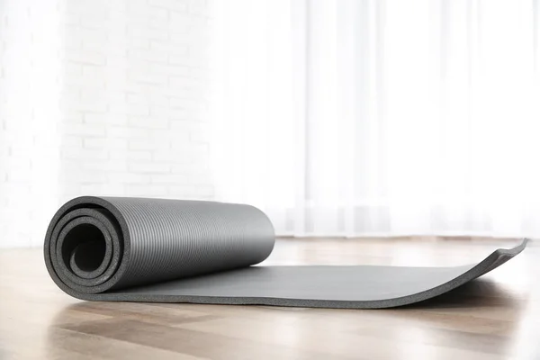 Rolled Grey Yoga Mat Floor Indoors — Stock Photo, Image