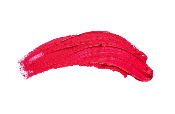 Красная помада мазок на белом фоне, вид сверху
