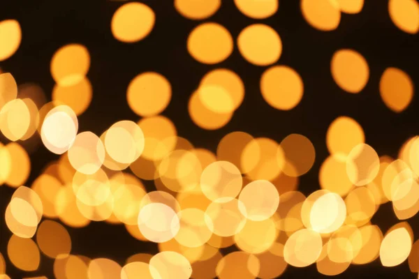 Hermosas Luces Doradas Sobre Fondo Oscuro Efecto Bokeh — Foto de Stock