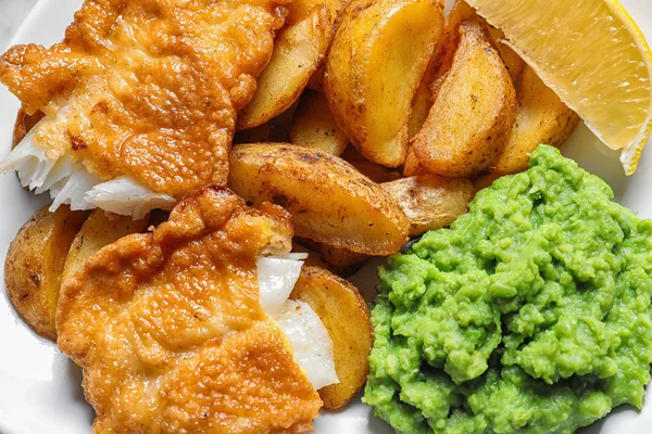 British traditional fish and potato chips, closeup