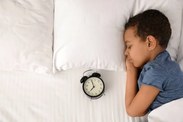 Cute Little African American Boy Alarm Clock Sleeping Bed Top — Stock Photo, Image