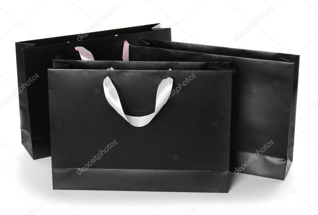 Paper shopping bags isolated on white. Mock up for design