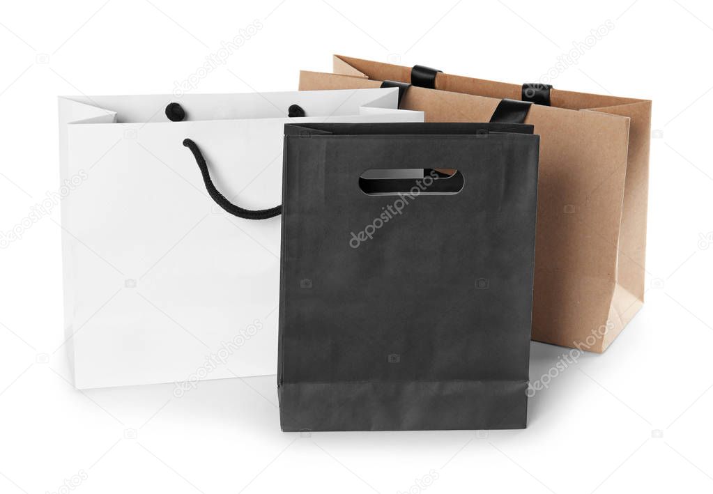 Paper shopping bags isolated on white. Mock up for design