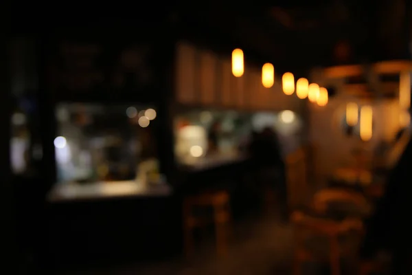 スタイリッシュなモダンなカフェのインテリアのビューをぼかします — ストック写真