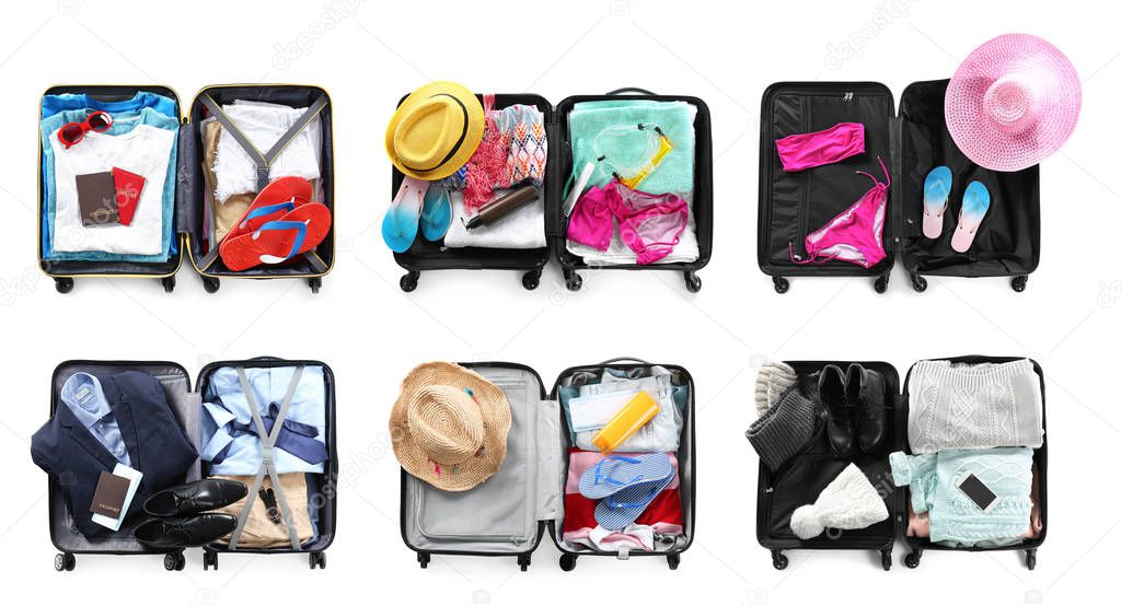 Set of different suitcases packed for travelling on white background, flat lay