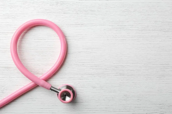 Pink Stethoscope Folded Awareness Ribbon Wooden Background Top View Space — Stock Photo, Image