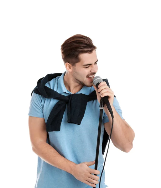 Jovem Homem Bonito Roupas Casuais Cantando Com Microfone Fundo Branco — Fotografia de Stock