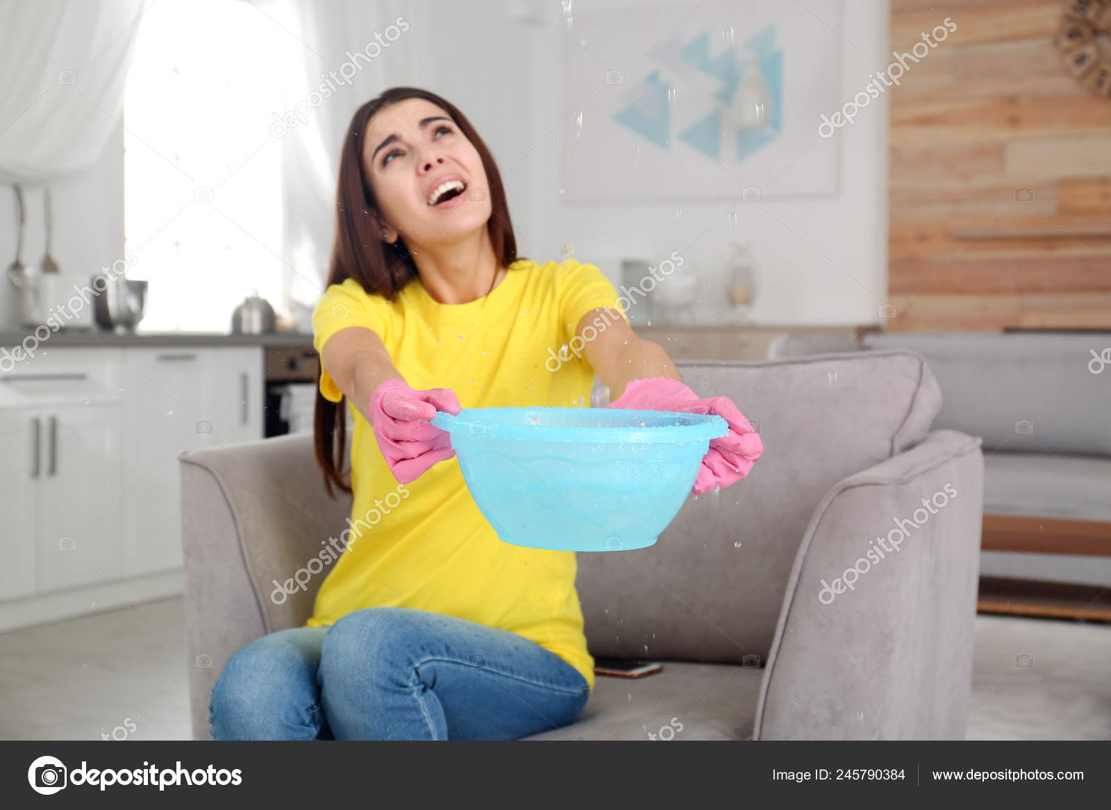 Woman Collecting Water Leaking Ceiling Home Time Call Plumber