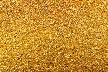 Arka plan, closeup olarak altın glitter dokusuna