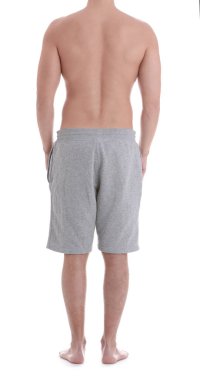 Beyaz arka planda, closeup genç atletik erkek. Kilo kaybı