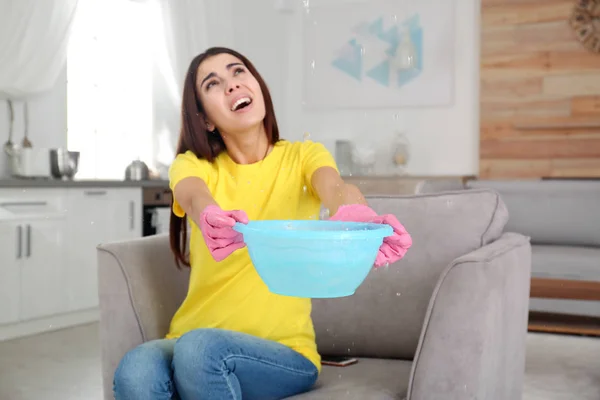 Woman Collecting Water Leaking Ceiling Home Time Call Plumber — Stock Photo, Image