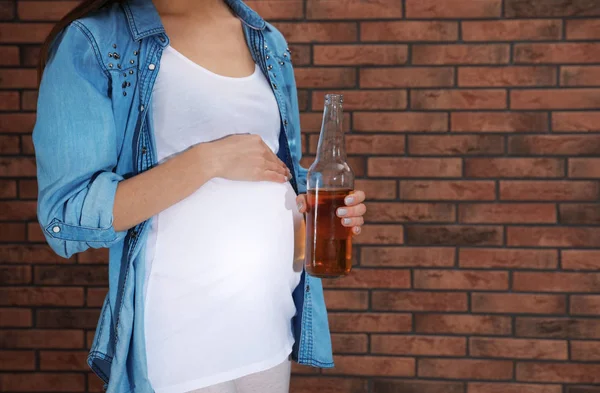 Future Mother Bottle Alcohol Drink Brick Wall Closeup Bad Habits — Stock Photo, Image