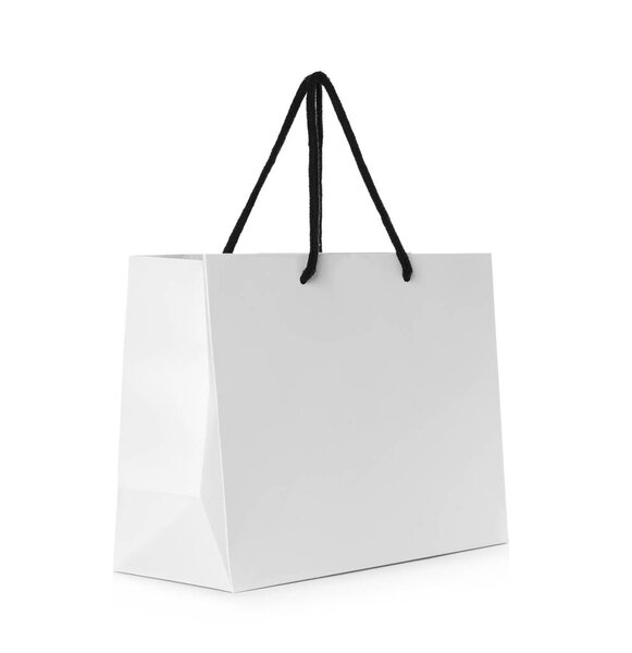 Paper shopping bag isolated on white. Mock up for design