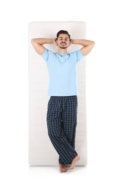 Young Man Comfortable Mattress Isolated White — Stock Photo, Image