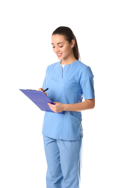 Young medical student with clipboard on white background