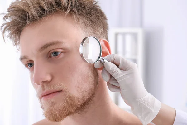 Dermatologist Examining Patient Magnifying Glass Clinic Closeup View — Stock Photo, Image