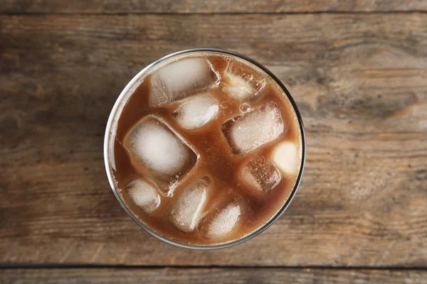 Glass Coffee Ice Cubes Wooden Background Top View — Stock Photo, Image