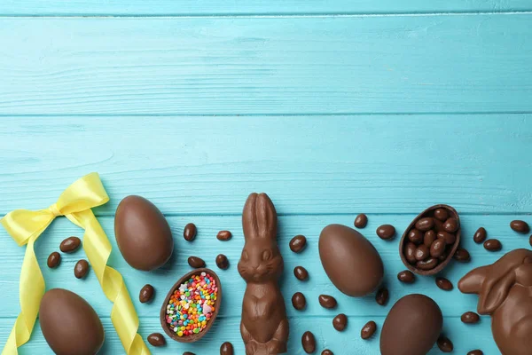 Flat Lay Composition Chocolate Easter Eggs Color Wooden Background Space — Stock Photo, Image