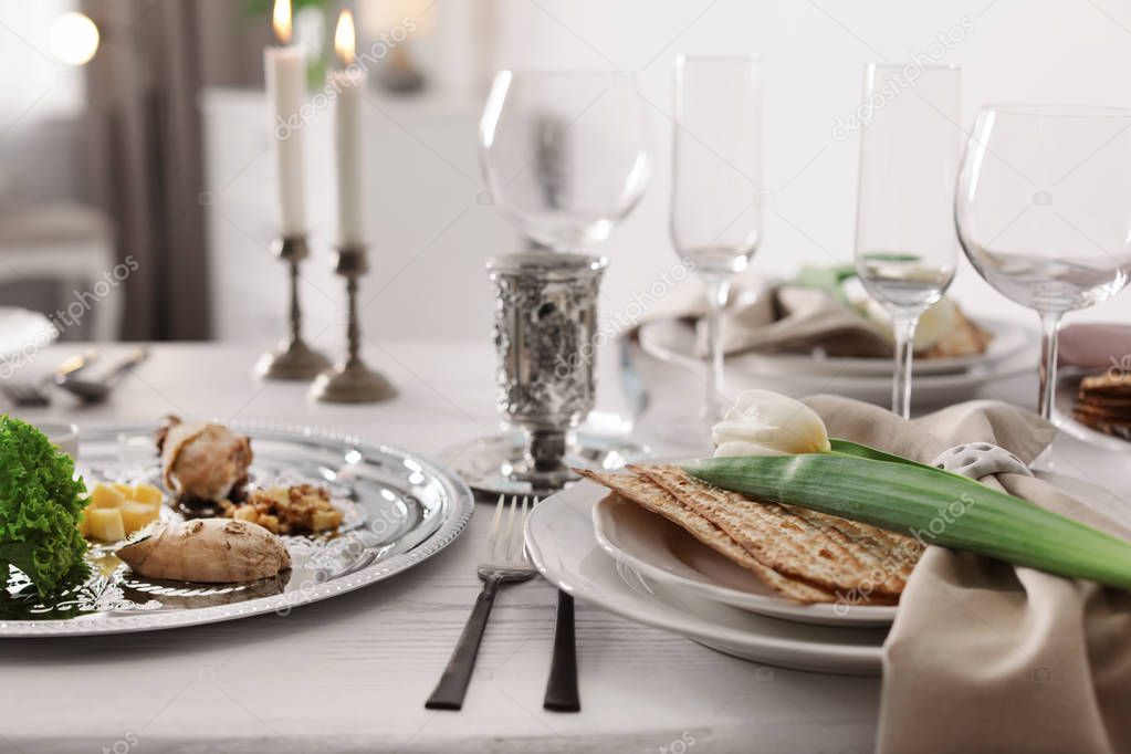 Festive Passover table setting at home. Pesach celebration