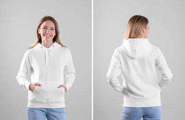 Açık renkli, ön ve arka sayısı boş hoodie kazaklı genç kadın. Sahte için tasarım