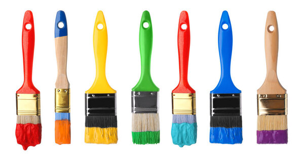 Set of different paint brushes on white background