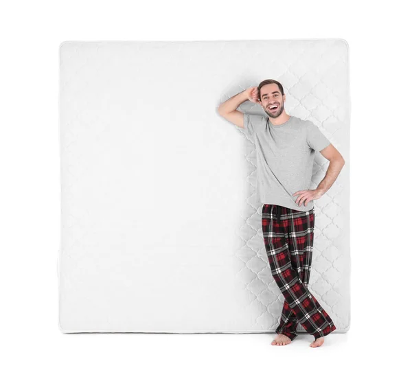 Jeune Homme Avec Matelas Confortable Isolé Sur Blanc — Photo