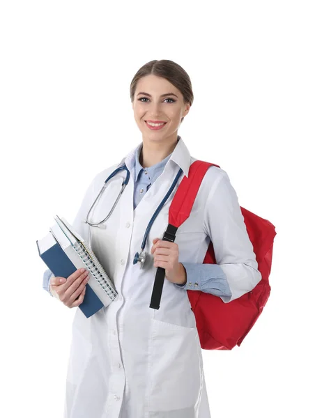 Junge Medizinstudentin Mit Büchern Und Rucksack Auf Weißem Hintergrund — Stockfoto