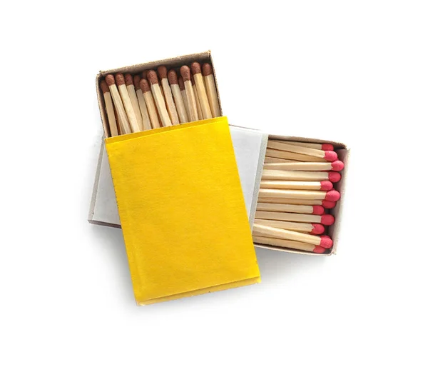 Cardboard boxes with matches on white background, top view. Space for design