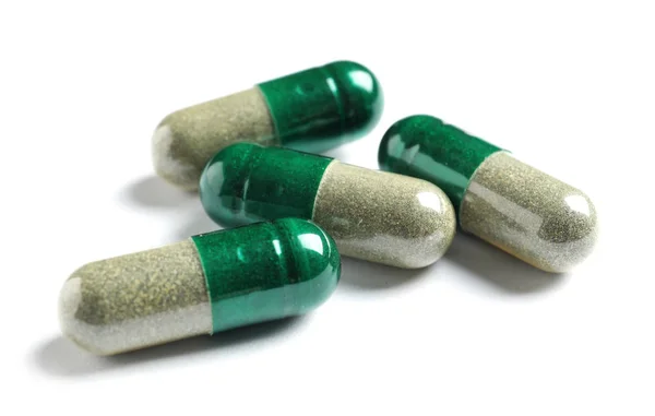 Green Spirulina Capsules White Background Alternative Medicine — Stock Photo, Image