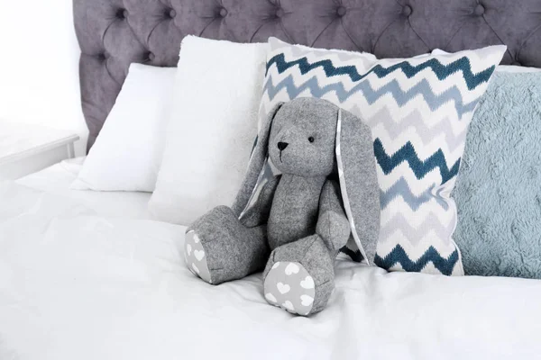 Cute Toy Rabbit Sitting Bed Indoors Space Text — Stock Photo, Image