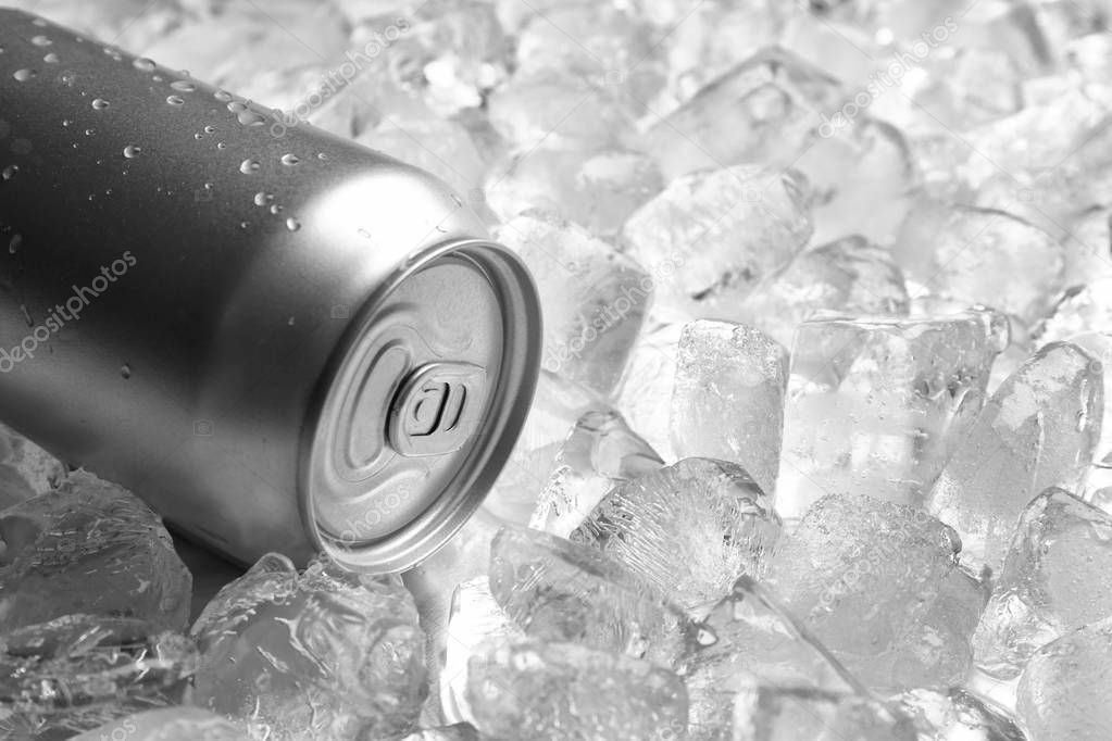 Tin can on pile of ice cubes