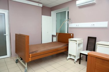 Interior of postoperative ward in modern clinic clipart