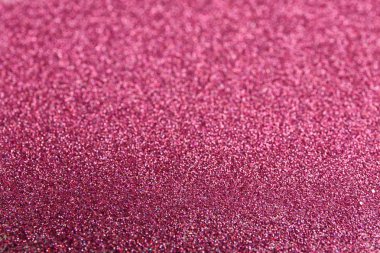 Parlak pembe glitter arka plan görünümünü portre