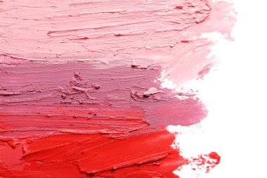 Vuruş ruj beyaz arka planda, üstten görünüm